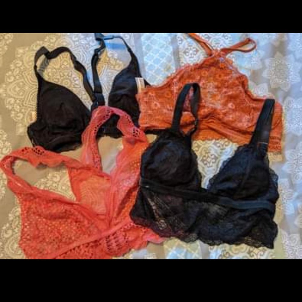Four brand new bralettes from Victoria's Secret. Size extra small.